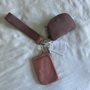 63-65 Lululemon Dual Pouch Wristlet - Pink Pastel/Twilight Rose
